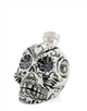 Distillato con note intense e dolci di agave fermentata e sapore pepato. Setosa e delicata, lascia sul palato un retrogusto speziato. Invecchiato meno di 18 mesi. Molto caratteristico il contenitore ispirato alle tradizionali maschere Calavera usate nel rituale del giorno dei morti a simbolizzare la morte e la resurrezione. Oggi particolarmente diffusa durante i festeggiamenti della notte di Halloween.